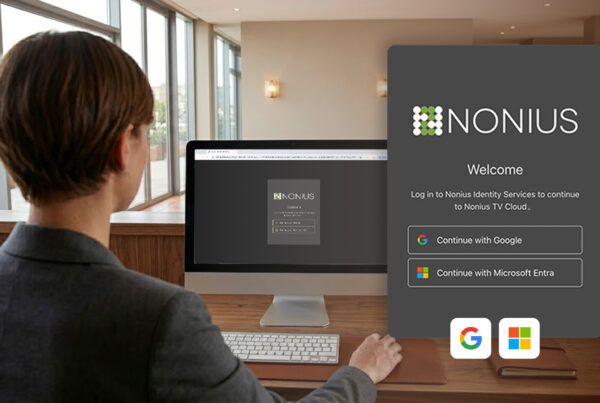 Hotel staff securely accessing Nonius platforms with single sign-on using Microsoft and Google authentication for ISO 27001 and SOC 2 compliance